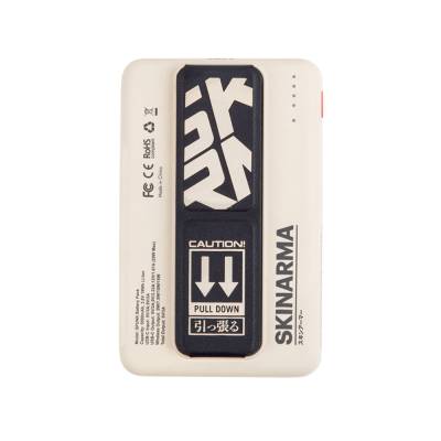SkinArma Spunk Taşınabilir Wireless Şarj ve PD Hızlı Şarj Özellikli Powerbank 15W 5000mAh Krem